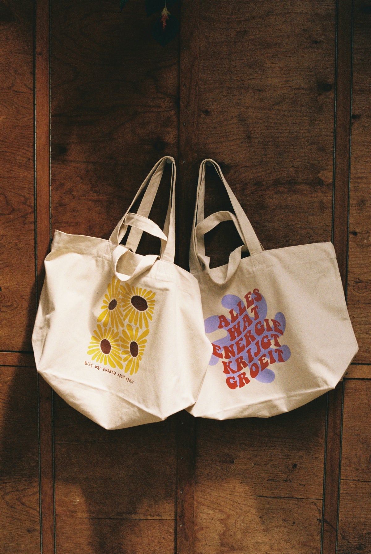 Grote shoppingbag "alles wat energie krijgt groeit"